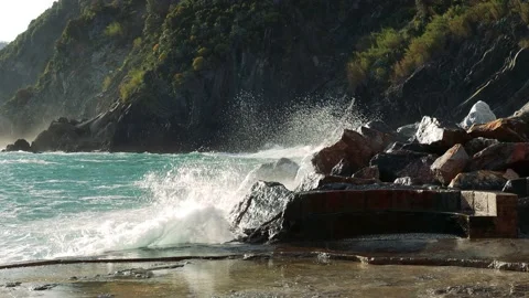 Waves of the sea crash on the rocks Stock Footage 156114202