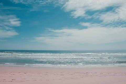 The waves of the sea crashed into the shore Stock Photos