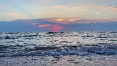 Waves on the sea during sunset. Relaxation, enjoyment. Journey to the ocean Stock Footage 218339995