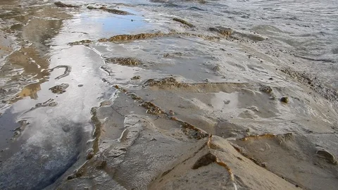 Waves of the sea gently lapping the cliff 4316 Stock Footage 107399868