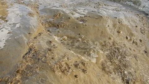 Waves of the sea gently lapping the cliff 4321 Video stock 107399883