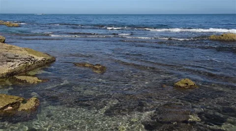 Waves on the sea landscape on a background of blue sky Stock Footage 55549636