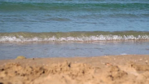 Waves of sea or ocean on sand beach. Empty tropical beach and seascape Stock Footage 237873284