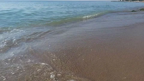 The waves of the sea reach the shore. Stock Footage 136959409