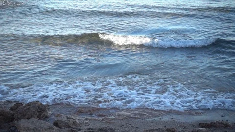 Waves of the sea reaching the shore of the beach Video stock 124468027
