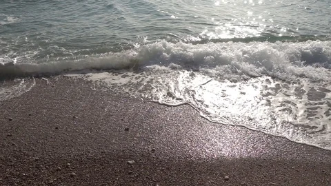 Waves of the sea reaching the shore of the beach Video stock 124469780