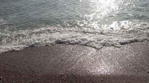 Waves of the sea reaching the shore of the beach Video stock 124470932