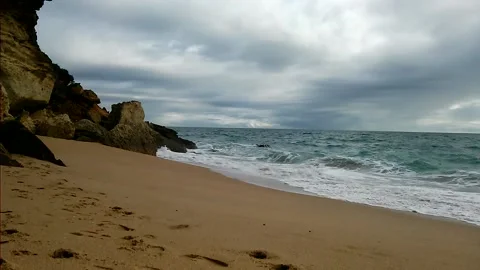 Waves of the sea reaching the shore. Stock Footage 154850953