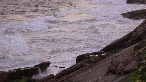 Waves of the sea on the rocks, end of the day Stock Footage 106684336
