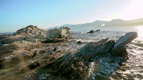 Waves in the sea rocks at summer, beach vibes Stock Footage 169688488