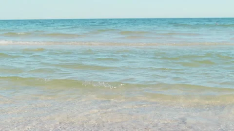 Waves of sea,  sand beach and sea. Tropical background.  close up shot waves Stock Footage 134839252