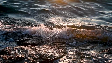 Waves on the sea at sunset. Coastline. Stock Footage 253754475