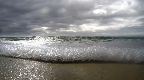 The waves of the sea with a very fast-moving clouds. Strong wind. Video stock 62708260