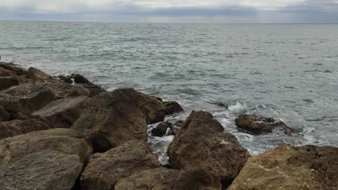 Waves. Sea. Waves of the Mediterranean breaking and splashing on the rocks Stock Footage 202135345