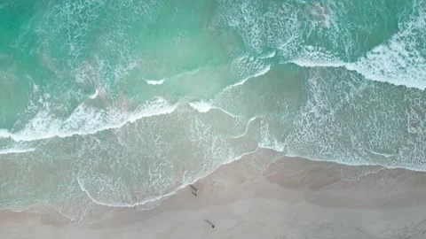 Waves in the sea. Waves of water. Ocean whirlpools. Aerial view on sea beach Stock Footage 307855030
