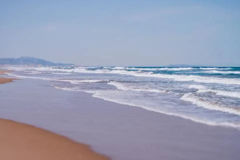 Waves on a seashore Stock Photos