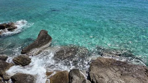 Waves on the seashore in slow motion Stock Photos
