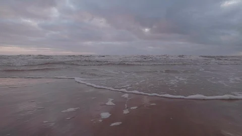 Waves at the seashore on a windy day Stock Footage 125286124