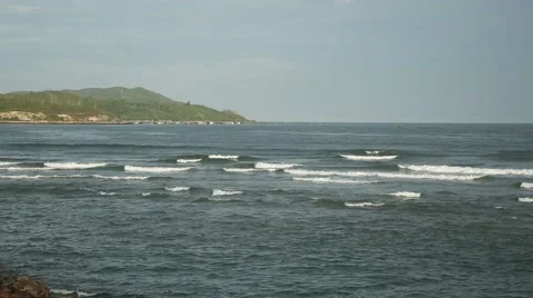 The waves in the shallows Stockbeeldmateriaal 65376501