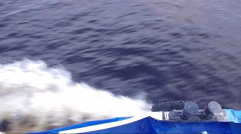 Waves from the ship cleave the water top view Stock Footage 51571173