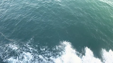 Waves from ship with foam on the sea surface  Stock Footage 121993989