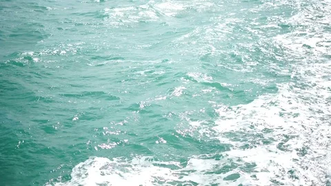 Waves from a ship in the ocean, foam - top view Stock Footage 117297105