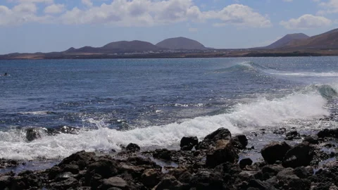 Waves on the shore of the Atlantic Ocean, Lanzarote island Stock Footage 304549106