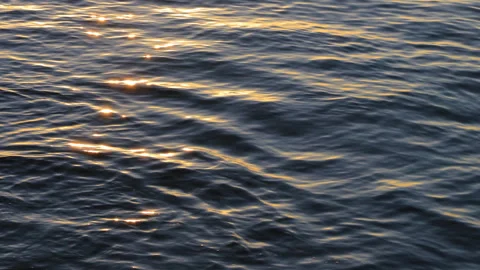 Waves on the shore of the Atlantic Ocean at sunset Stock Footage 304652274