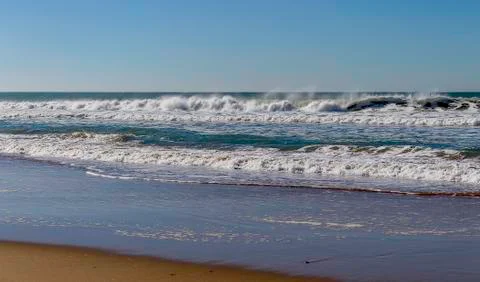 Waves on the shore of the beach Stock Photos