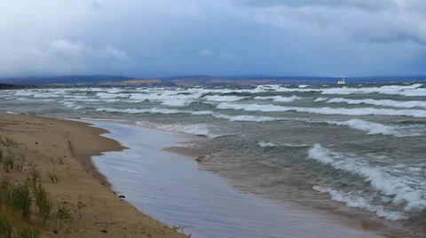 Waves on the shore during a windy day Stock Footage 37216514