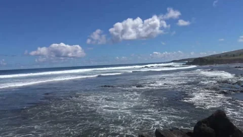 Waves on the shore of Easter Island Stock Footage 162813627