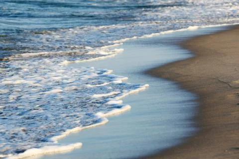 Waves on shore Stock Photos