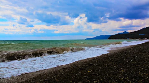 Waves on the shore of the winter sea Video stock 37808606