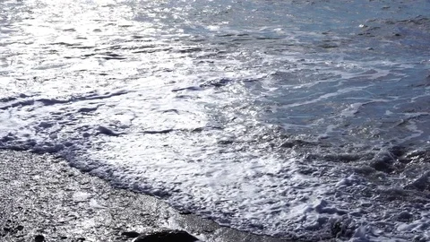 Waves on the shoreline Video stock 85249240