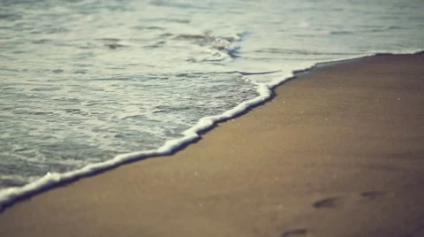 Waves on the shoreline. Handheld shot Stock Footage 46474972