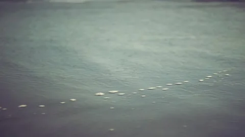 Waves on the shoreline. Handheld shot Stock Footage 46475233