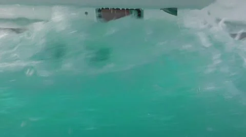 Waves slam the catamaran hulls as we move through heavy seas as seen  from em Stock Footage 67862538