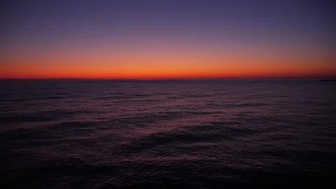 Waves in slow motion and sunset at sea Stock Footage 131422862