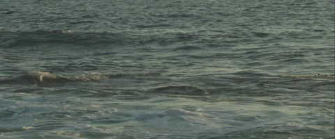 Waves in slow motion at sunset, anamorphic Stock Footage 46033102