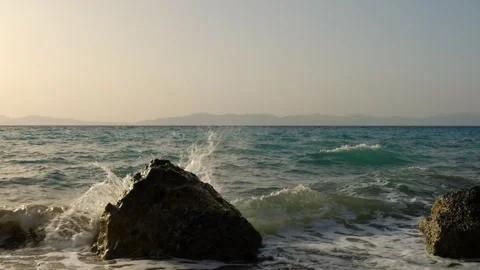 Waves smashing against rocks Stock Footage 278063233