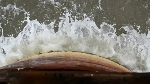 Waves smashing into pillar - half speed Stock Footage 106094295