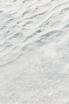 Waves in the snow. Transition from smooth to waves Stock Photos