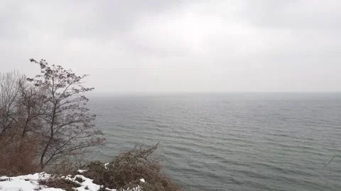 Waves on the snowy beach during winter in Gdynia, Poland. Stock Footage 258884169