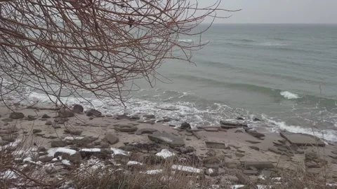 Waves on the snowy beach during winter in Gdynia, Poland. Stock Footage 258887416