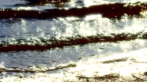 Waves sparkle in water Stock Footage 8359905