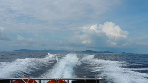 Waves from a speedboat Stock Footage 211877322