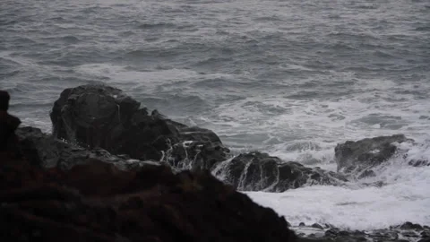 Waves Splash against Rocks on Icelandic Black Sand Beach Stock Footage 140924801