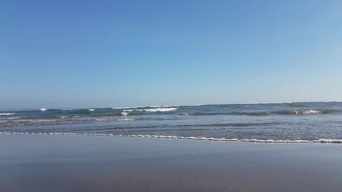 Waves splash on the beach of the ocean on the island of Bali Stock Footage 93433433