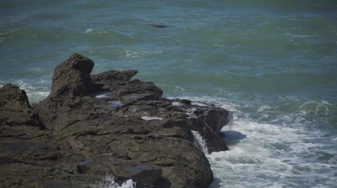 Waves splash on rocks near beach at Moon Stone Beach Stock Footage 62475052