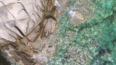 Waves splash rocky beach Stock Footage 315315161